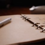 white pen on white paper